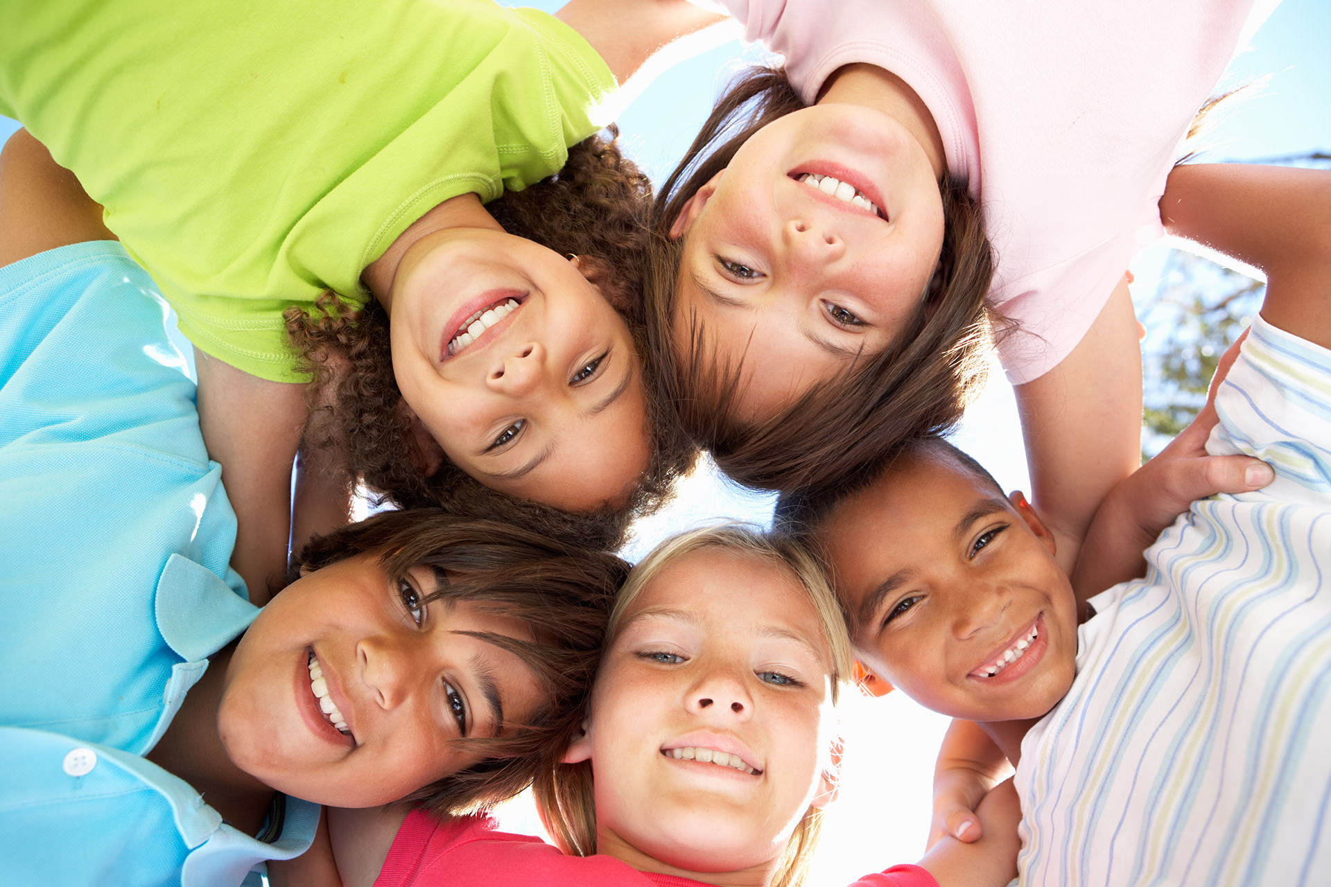 Group of kids slide for Pediatric Dentist Dr. Mauricio Marcushamer in Downtown San Antonio, TX